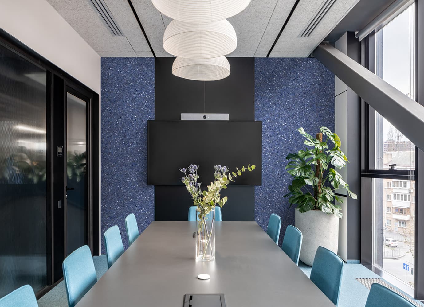 Denim blue cotton wallpaper in an office, adding a modern and calming touch.