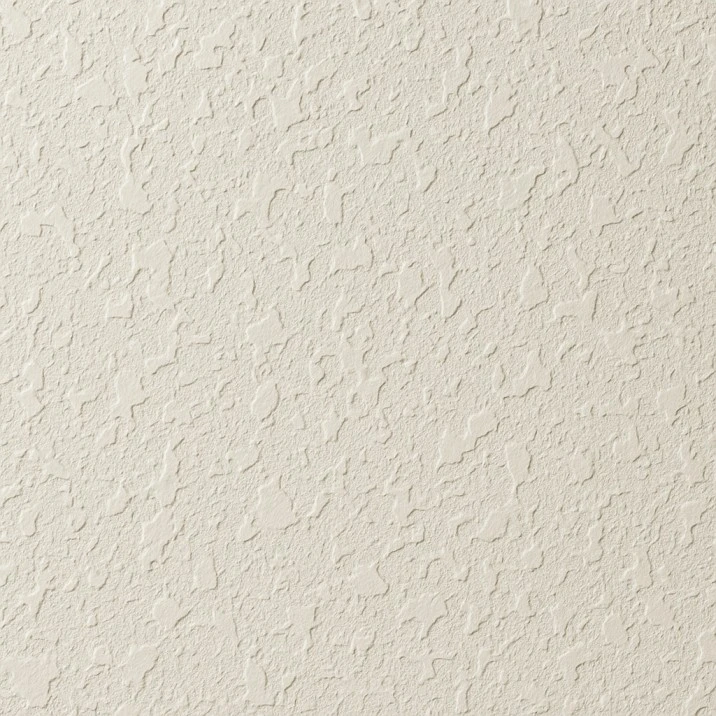 Close-up of knockdown drywall texture showing flattened mottled surface